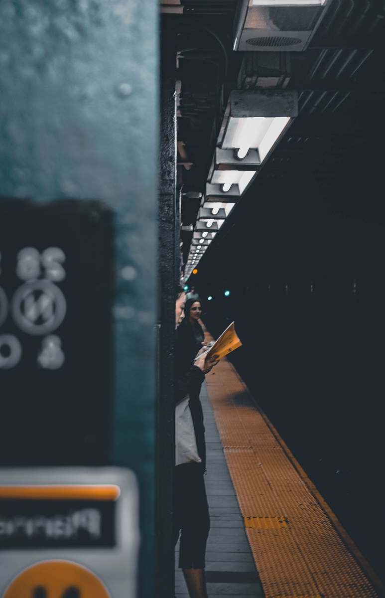 united states two women standing in front of train platform
